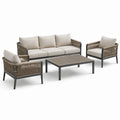 Set salotto da esterno in rattan con cuscini in tessuto crema e struttura in metallo