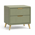 Comodino a due cassetti in legno verde con gambe in metallo dorato